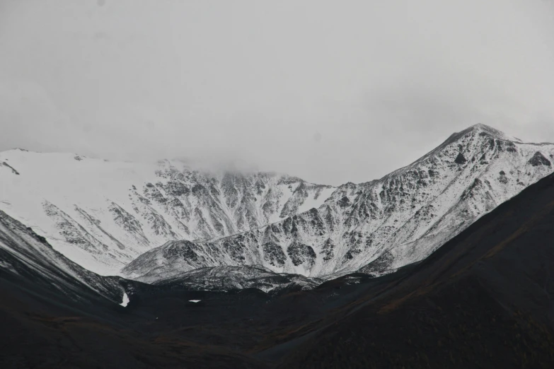 black and white mountain view in the snowy day