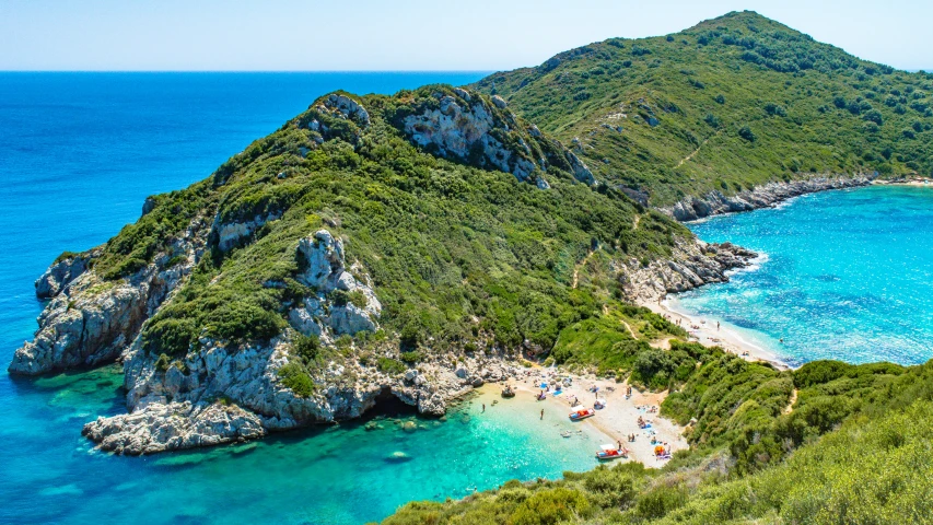 an aerial view of a beach in the island