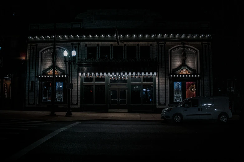 a night time view of an old building