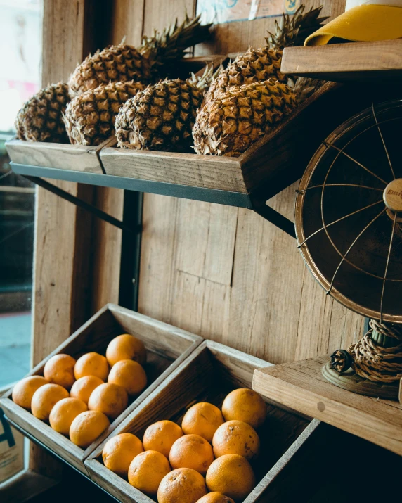 shelves in a shop that have many fruits