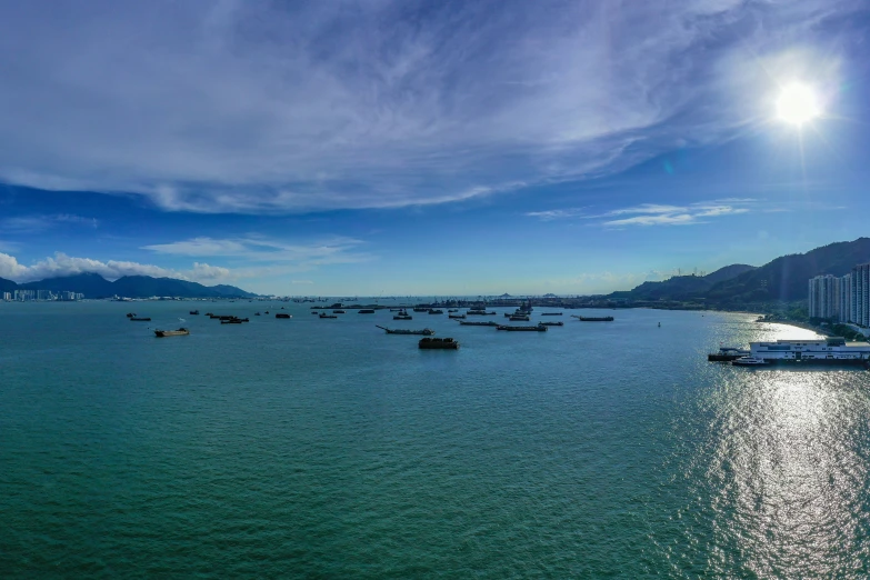 boats and yachts in the water on a sunny day