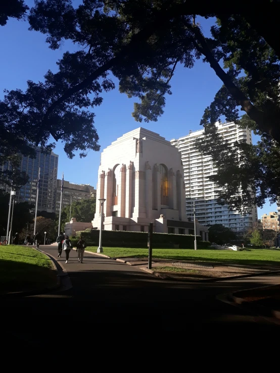 a white church in the middle of a park