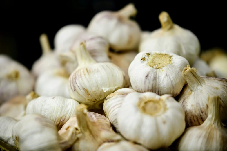 some garlic sitting in the middle of a table