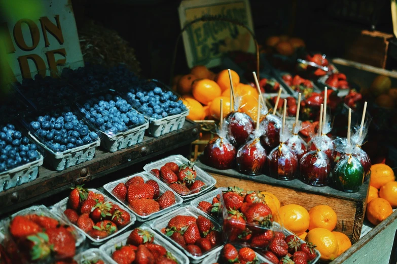 a market stall filled with lots of fruit and vegetables