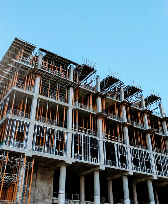 a large building with lots of windows under construction