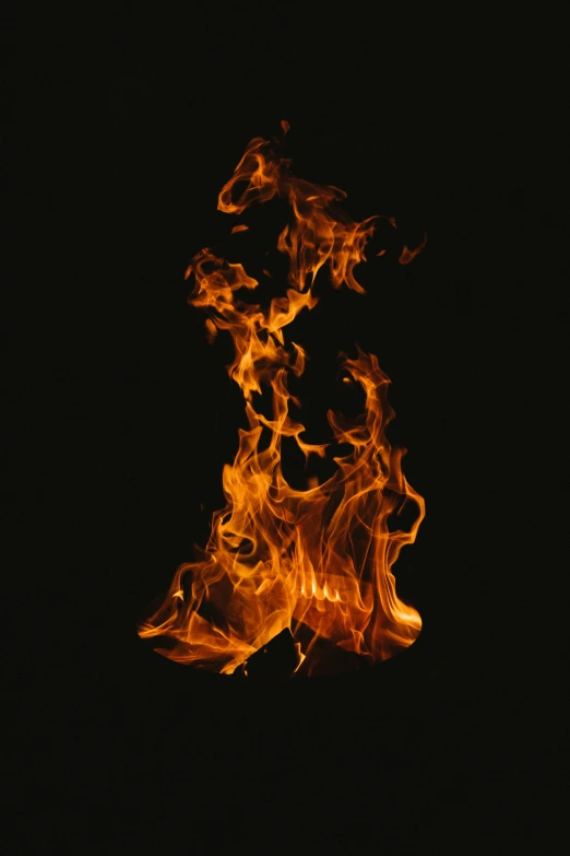 a fire has a black background and appears very black