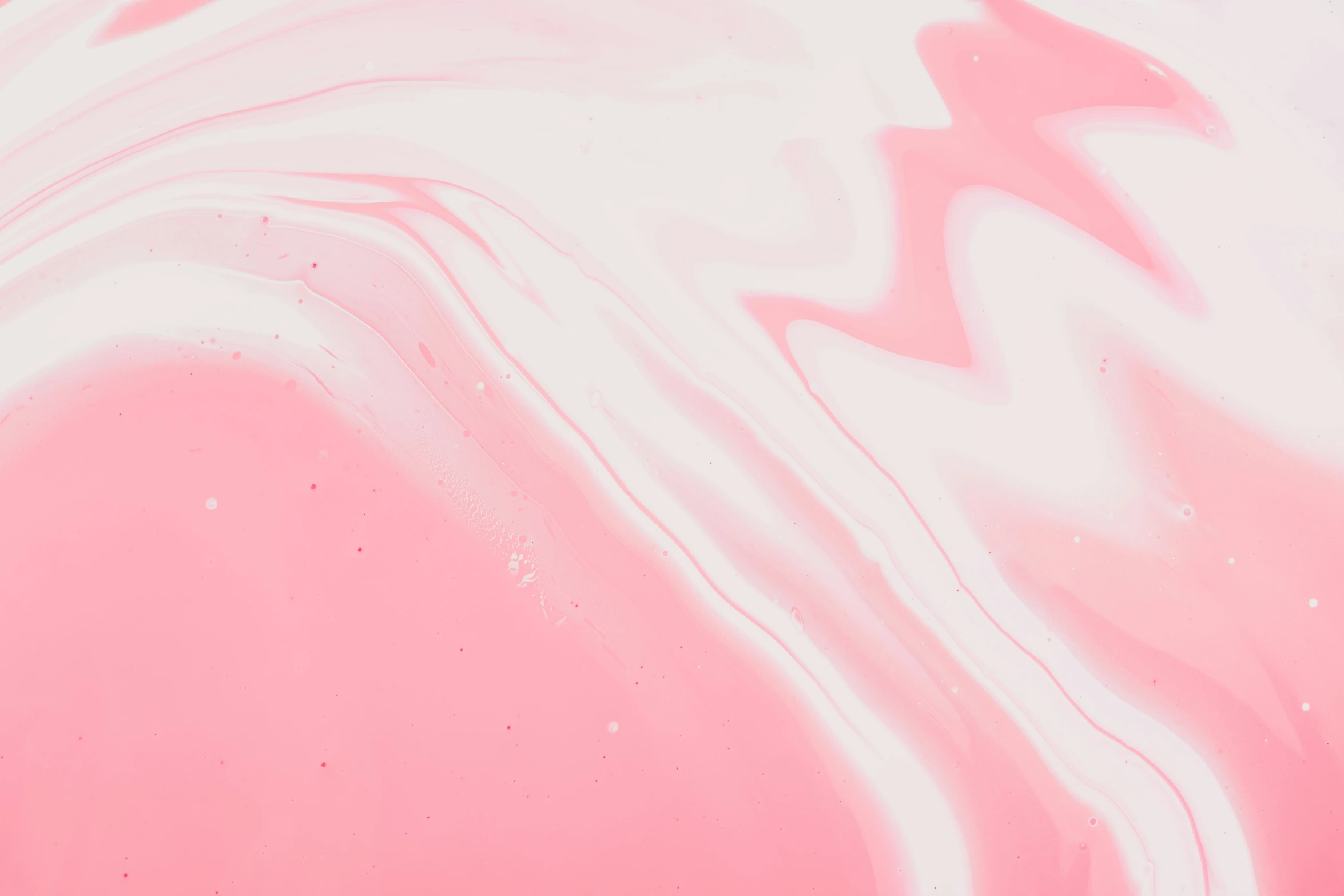 pink and white swirled liquid substance on white paper