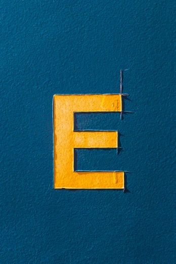 the letter e is made out of two blocks of plastic
