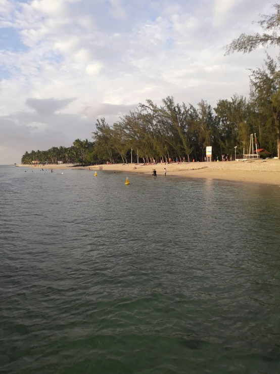 a beach area with a very large body of water