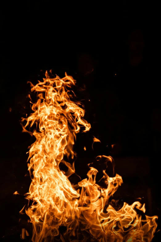 a group of fire on a black background