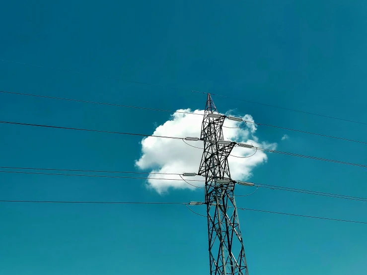 the cloud is in the distance against the blue sky