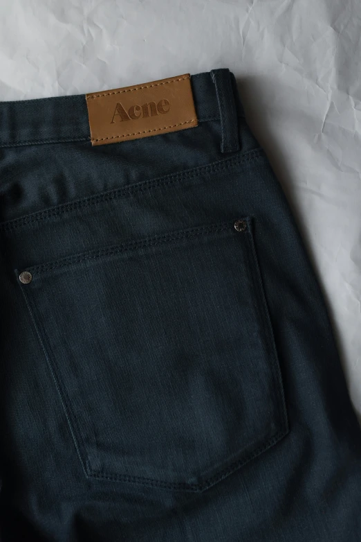 a po of a pair of dark colored jeans