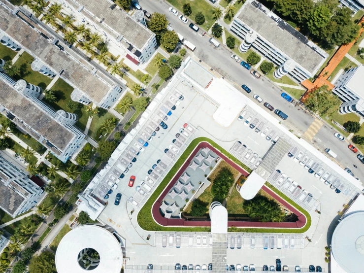 an aerial view shows the parking lot and surrounding buildings