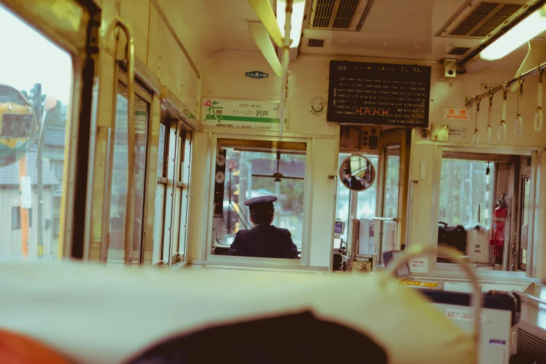 a view from inside a subway car through the window