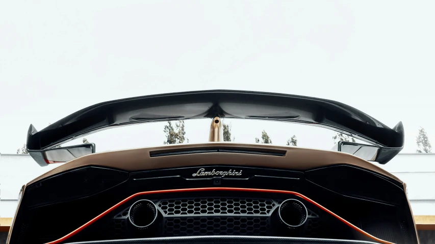 the rear view of a black sports car