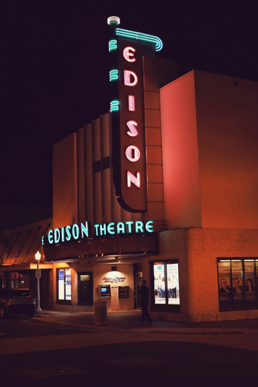 a building that has a sign that reads edison theatre