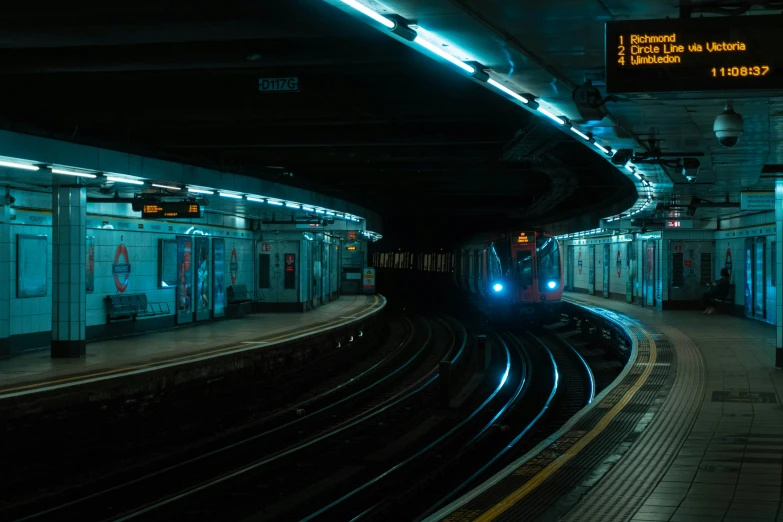 train arriving at a train station, as seen from the inside