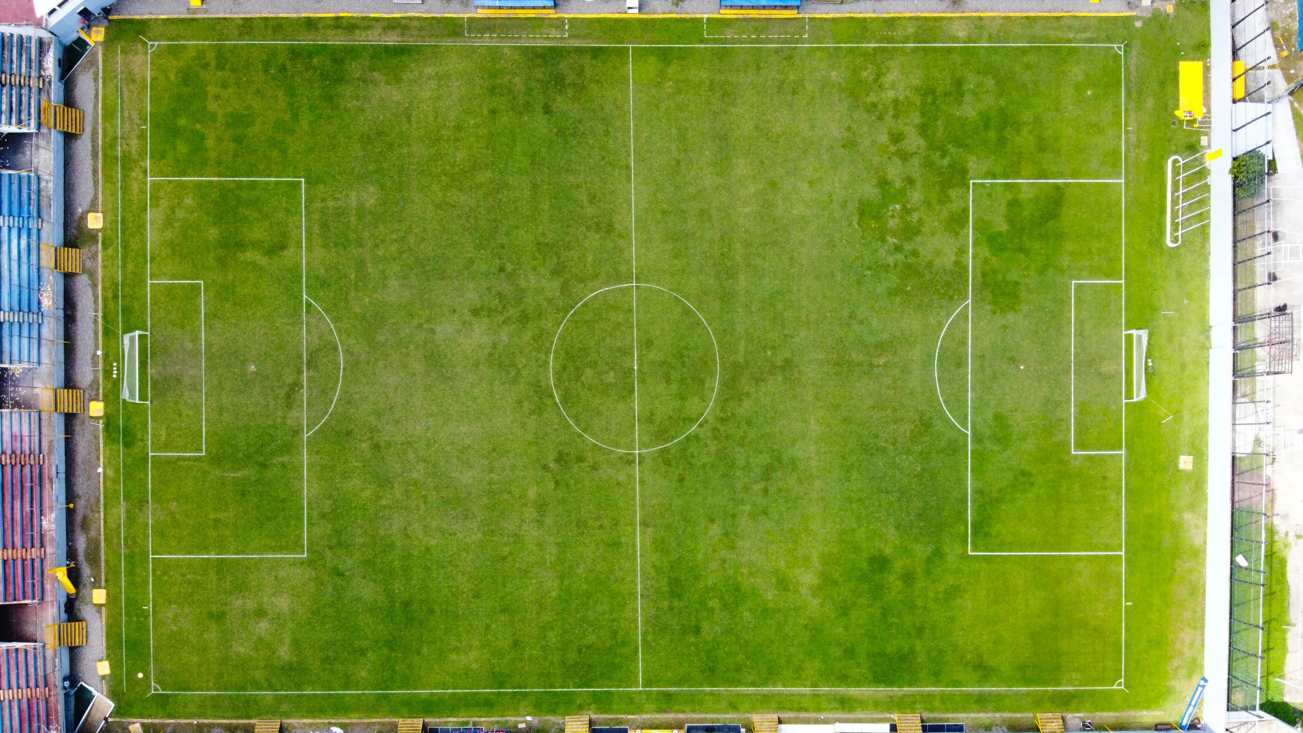 a soccer field in a field of grass