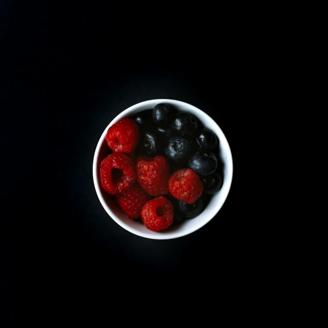 berry berries and blueberries in a bowl