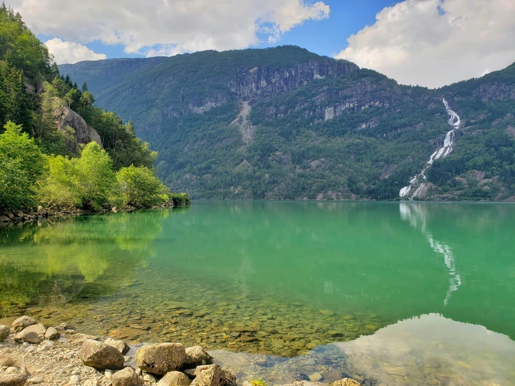 a river in the middle of a mountainous area