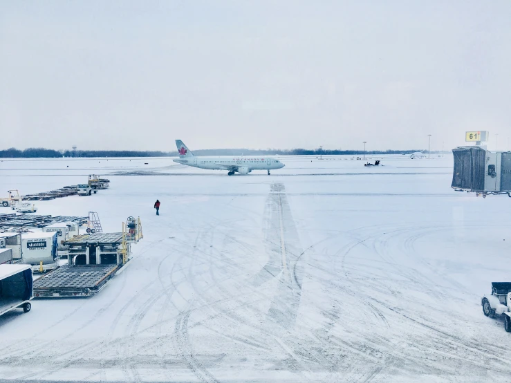 a big jet sitting on top of an airport runway