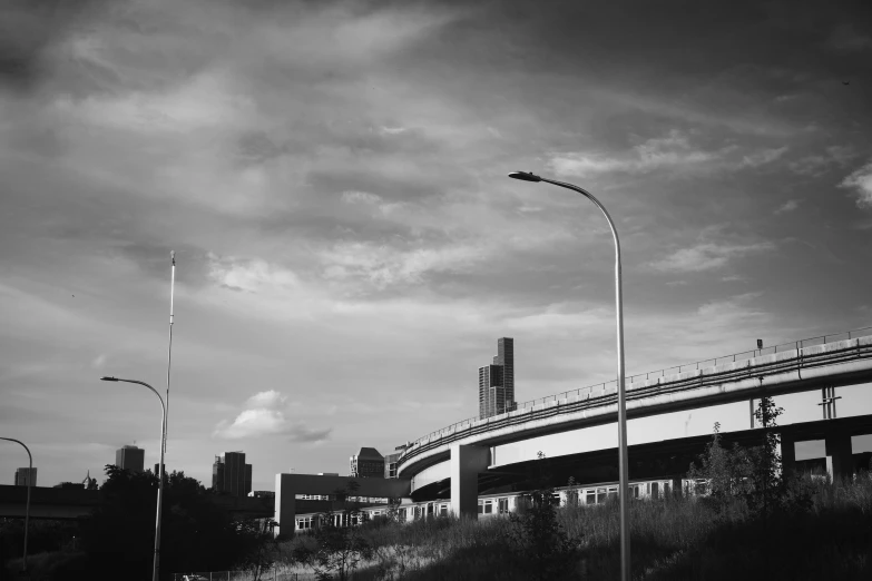 a large city under cloudy skies and sky