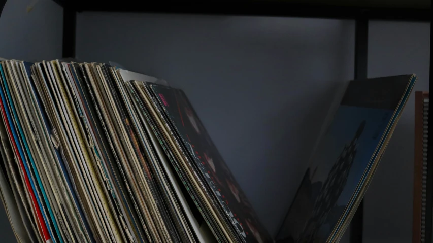 many different colored records stacked up together