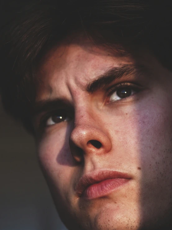 closeup of a person wearing a suit and tie