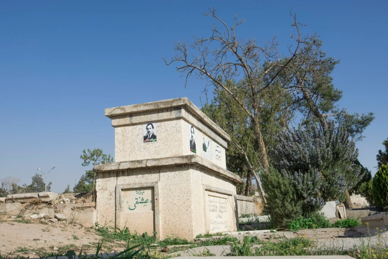 a stone tower with clocks in it's corner