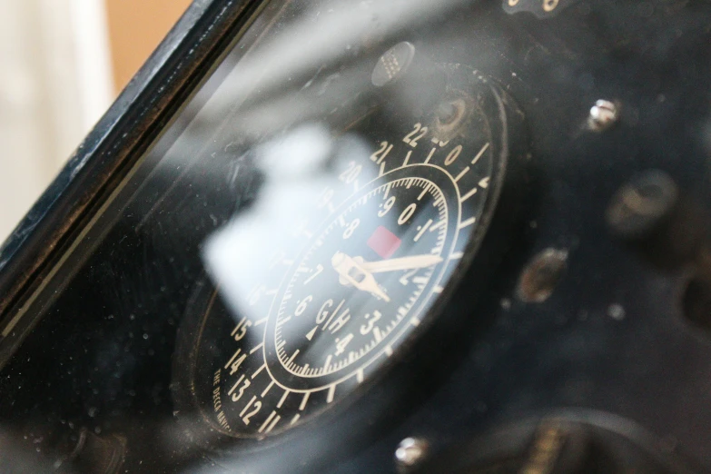 reflection of clock face on the wall