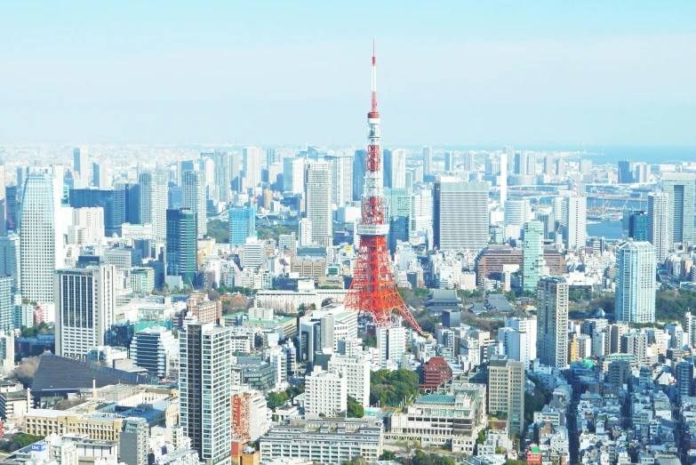 a very tall building towering over a city