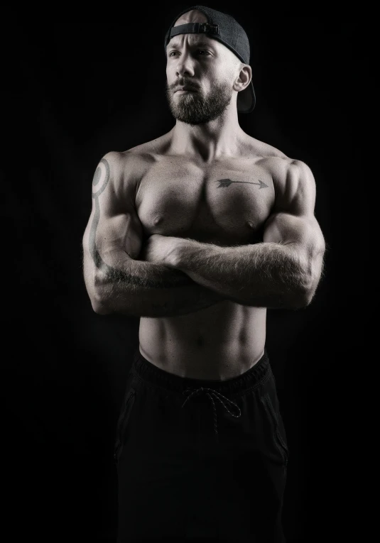 black and white image of a shirtless man