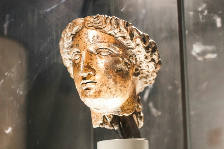 closeup of a head of an old roman sculpture