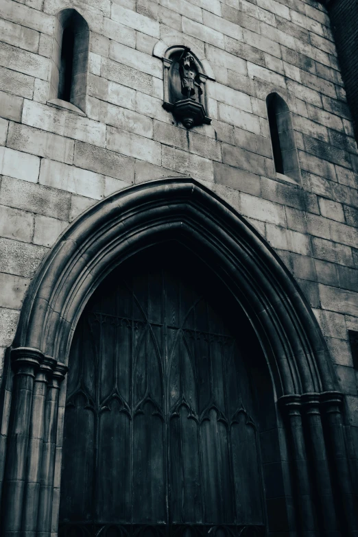 a gothic black and white pograph of an old church