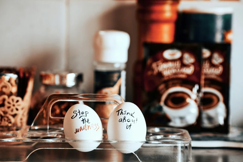 a couple of eggs sitting on top of a counter