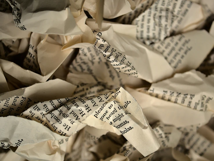 an image of closeup of sheets of torn paper