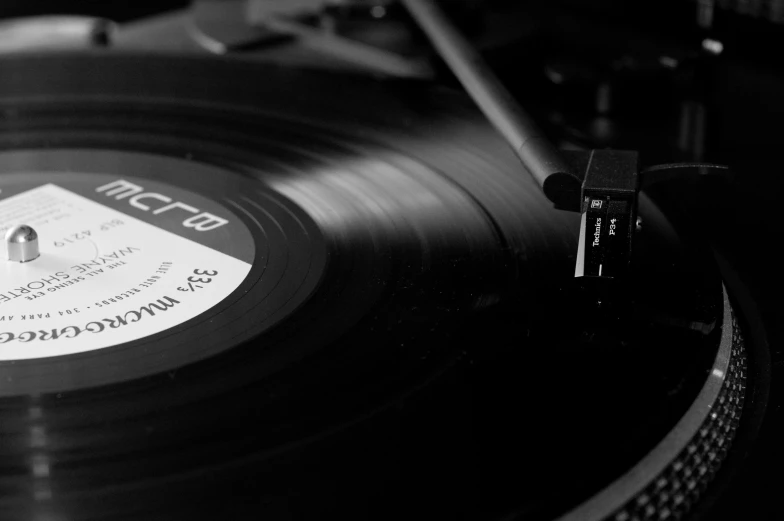 a black and white po of a record player