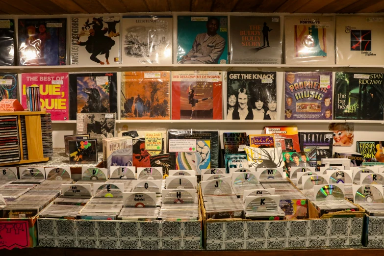 a large group of books are lined up behind each other