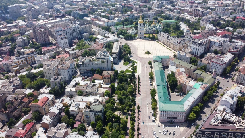 aerial view of city with lots of tall buildings