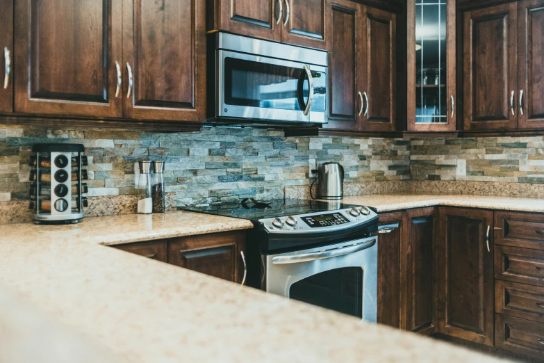 a microwave oven in a kitchen built into some wood cabinets