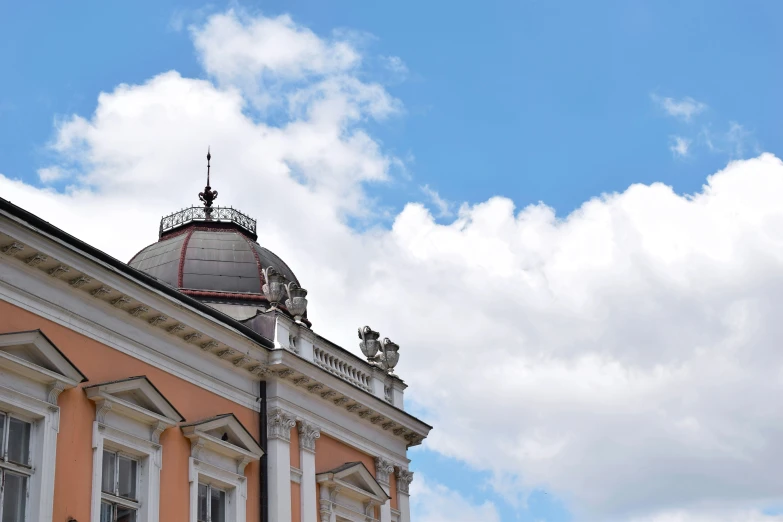 a large building with a clock on the top