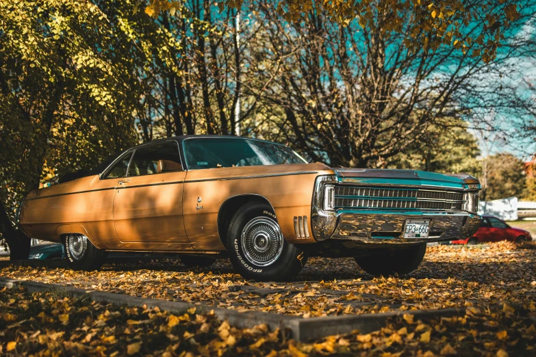 an old car parked on the side of the road