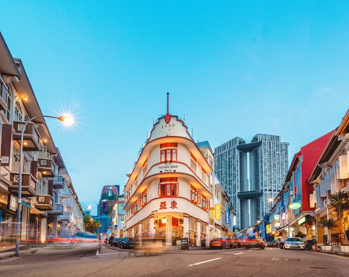 a street with some traffic at twilight