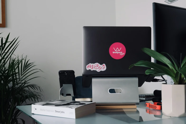 an electronic laptop computer sitting on top of a desk