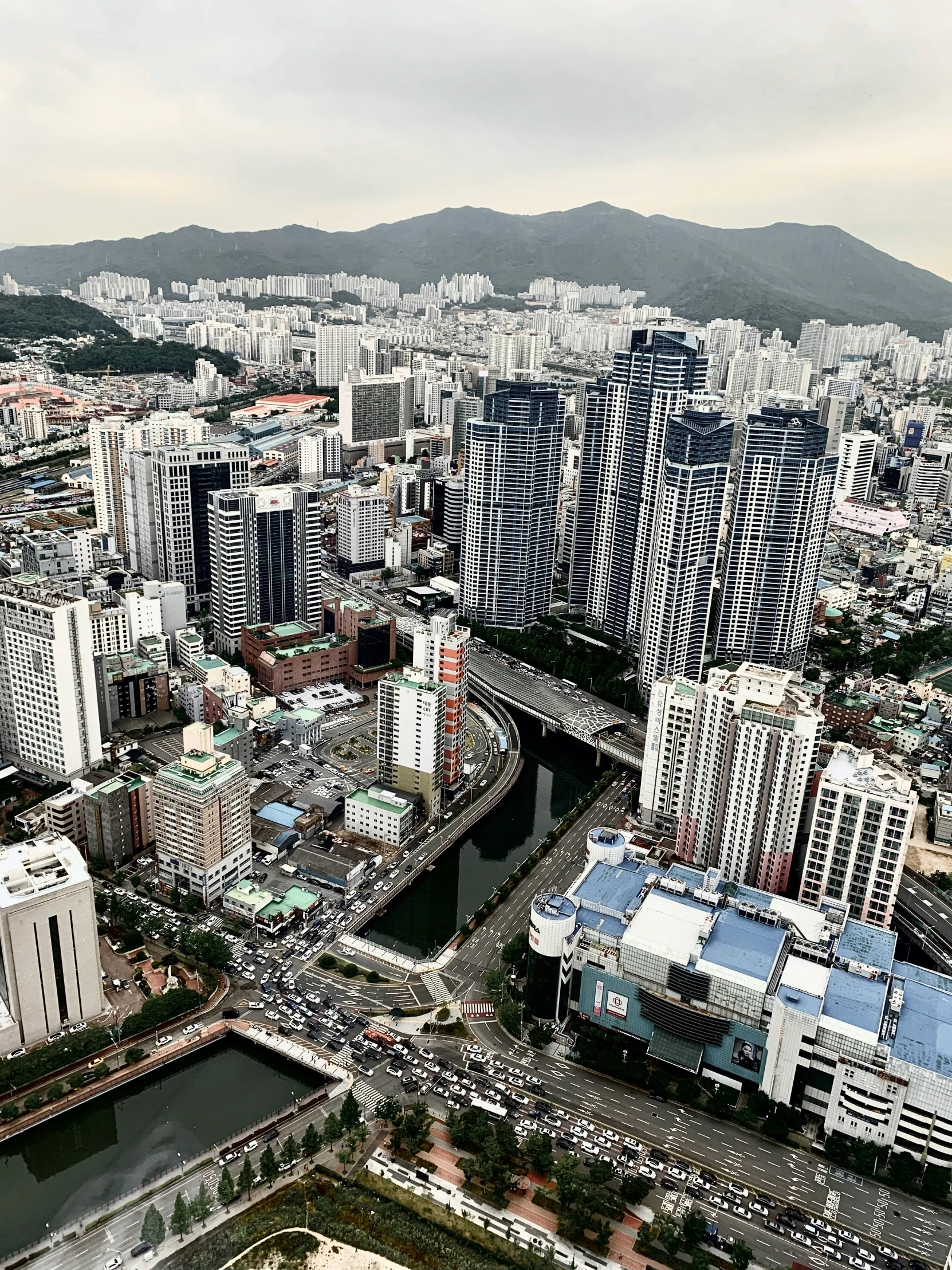 view of an urban city, with tall buildings