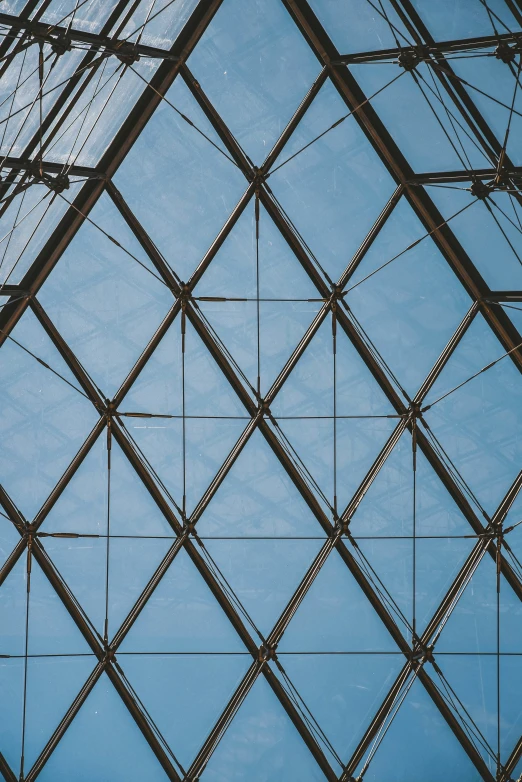 the underside view of a building's glass roof