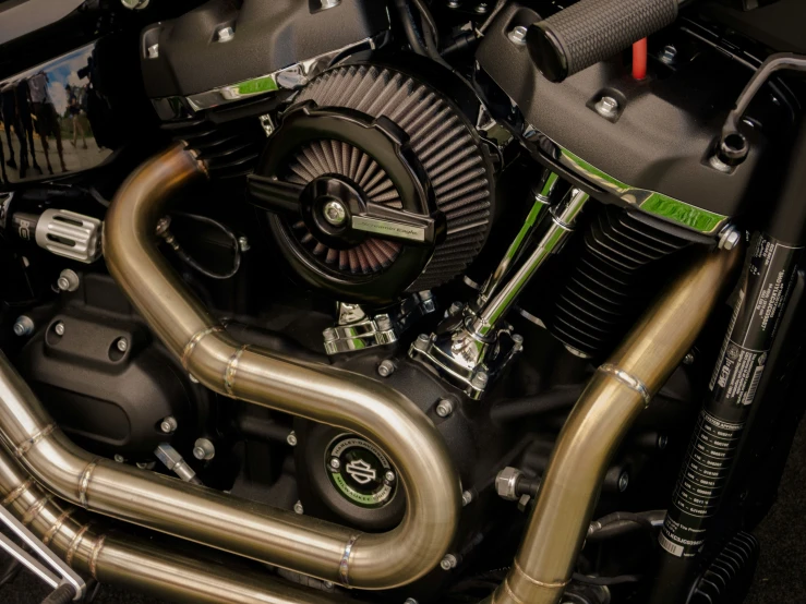 the engine compartment on a motorcycle with its water hoses