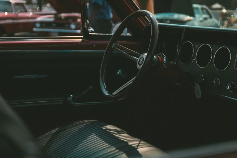 view from the inside of an antique car looking down