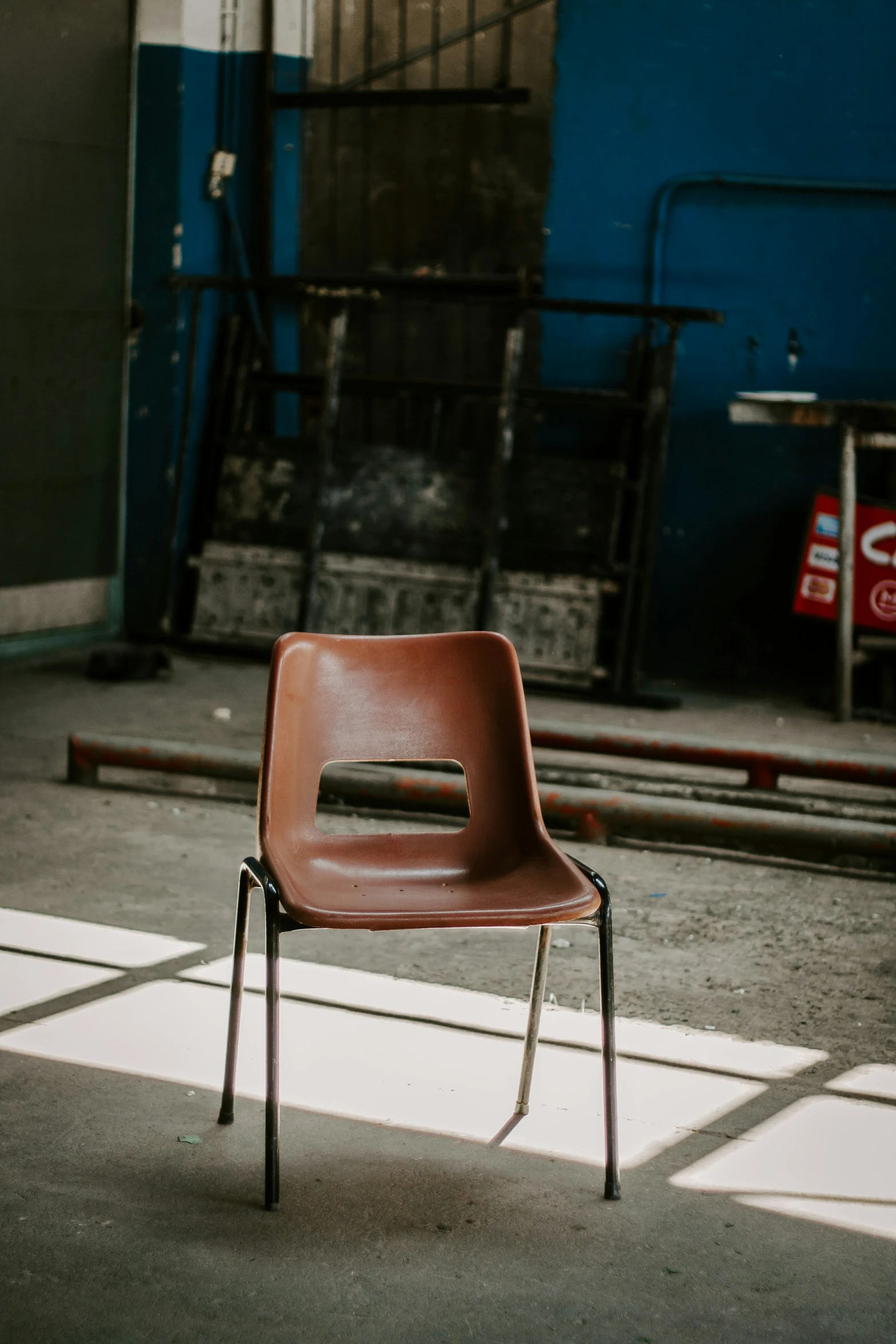 a chair sitting on top of the cement floor