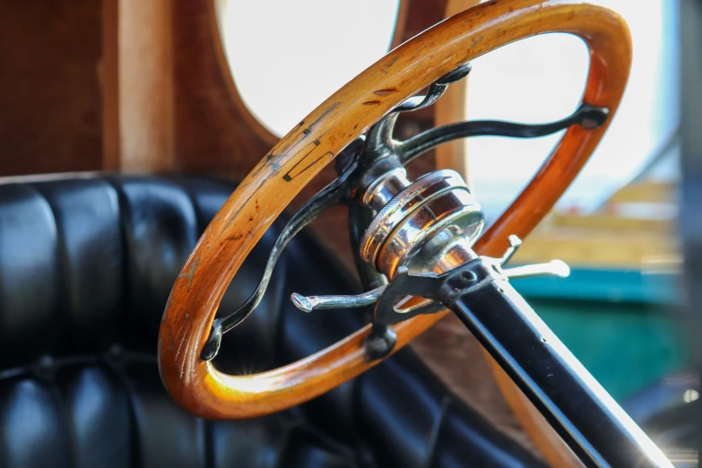 a steering wheel and the dashboard of a car